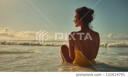 Woman enjoying sunset at the beach 132614791