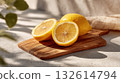 Lemons on a cutting board 132614794