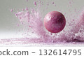 Pink ball makes powder splash 132614795