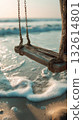 Swing near the ocean waves at sunset 132614801