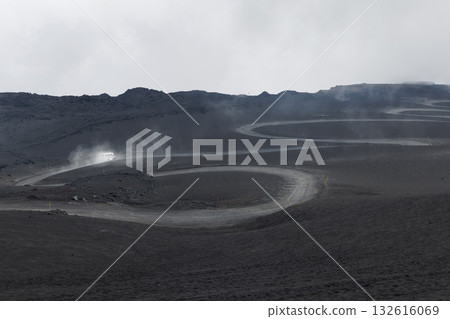 Off Road Excursion Trucks carry Passengers to the Bus Stop at the Volcano 132616069