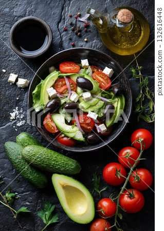 Fresh salad ingredients arranged in a colorful display for a healthy meal 132616448