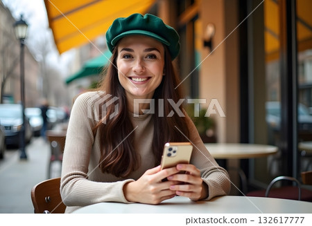 attractive young blond woman sitting in cafe using smart phone drinking coffee in spring summer autumn fashion trend outfit smiling happy in beige suit street style, laughing taking pictures on camera attractive young blond woman sitting in cafe using smart phone drinking coffee in spring summer autumn fashion trend outfit smiling happy in beige suit street style, laughing taking pictures on camera 132617777