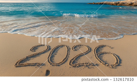2026 banner. Happy New Year 2026 written on beach sand 2026 banner. Happy New Year 2026 written on beach sand 132617810