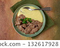liver beef stroganoff with mashed potatoes, table setting in green tones, homemade, 132617928