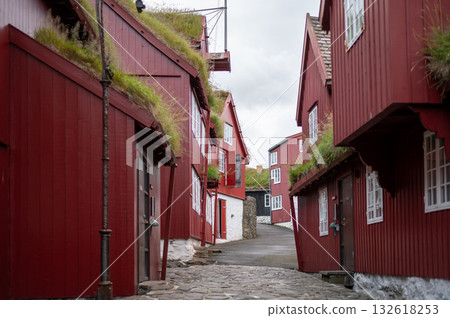 Torshawn city, the capital of The Faroe Islands, Denmark. Vestaravag harbor in Torshavn with its boats and colorful buildings. High quality photo Torshawn city, the capital of The Faroe Islands, Denmark. Vestaravag harbor in Torshavn with its boats and colorful buildings. High quality photo 132618253