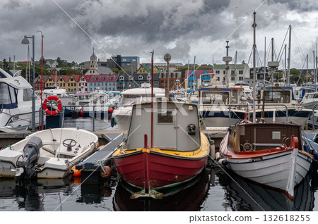 Torshawn city, the capital of The Faroe Islands, Denmark. Vestaravag harbor in Torshavn with its boats and colorful buildings. High quality photo Torshawn city, the capital of The Faroe Islands, Denmark. Vestaravag harbor in Torshavn with its boats and colorful buildings. High quality photo 132618255