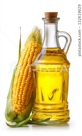 A bottle of golden corn oil stands next to a fresh ear of corn 132619029