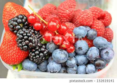 a bowl full of mixed fresh fruit 132619141