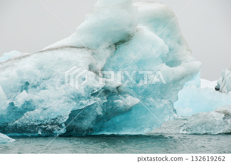 Jokulsarlon is a glacial lake in Iceland, located south of the Vatnajkull glacier, by a black sand beach, which overlooks the Atlantic Ocean Jokulsarlon is a glacial lake in Iceland, located south of the Vatnajkull glacier, by a black sand beach, which overlooks the Atlantic Ocean 132619262
