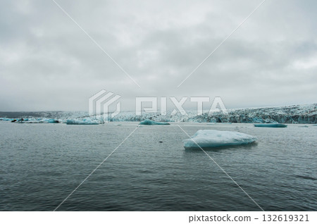Jokulsarlon is a glacial lake in Iceland, located south of the Vatnajkull glacier, by a black sand beach, which overlooks the Atlantic Ocean 132619321