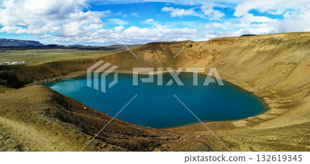 Blue lagoon in the crater of the Vti volcano, over 300 meters in diameter, in Iceland 132619345