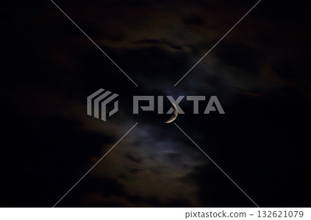 Moon in the clouds 132621079