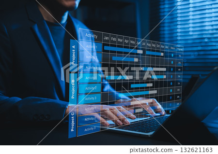 Project management and planning concept. Person using laptop with Gantt chart showing project activities, timelines, progress tracking, schedule symbolizing project management, workflow optimization Project management and planning concept. Person using laptop with Gantt chart showing project activities, timelines, progress tracking, schedule symbolizing project management, workflow optimization 132621163