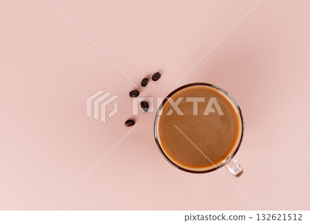 A cup of coffee with milk and a spoonful of natural stevia sweetener. Top view. Copy space. A cup of coffee with milk and a spoonful of natural stevia sweetener. Top view. Copy space. 132621512