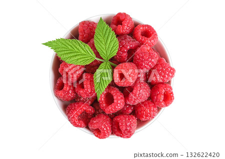 Ripe raspberries in ceramic bowl isolated on a white background. Top view. Flat lay 132622420