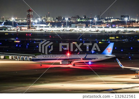 Haneda Airport at night, airplane taxiing, Ota Ward, Tokyo 132622561