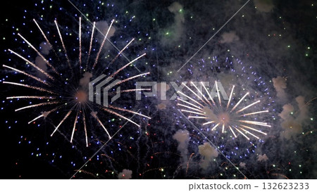 floral fireworks brighten silent night sky, symmetrical chrysanthemum explosions illuminate calm evening sky, blooming white and smoky petals create mesmerizing and tranquil spectacle in night floral fireworks brighten silent night sky, symmetrical chrysanthemum explosions illuminate calm evening sky, blooming white and smoky petals create mesmerizing and tranquil spectacle in night 132623233