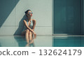 Japanese woman by the pool / Minimal hotel background, cleanliness, copy space Japanese woman by the pool / Minimal hotel background, cleanliness, copy space 132624179