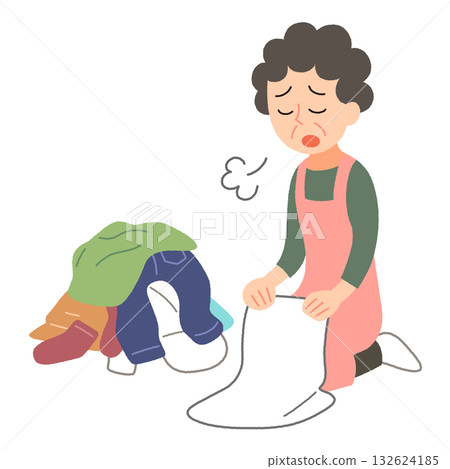 圖：一位中年婦女一邊疊衣服一邊嘆氣。 132624185