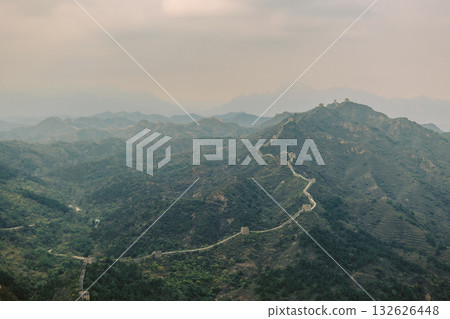 Aerial view of Simatai section of Great Wall of China in its original, un-restored state. Watchtowers perched on mountain peaks, Beijing, China. High quality photo 132626448