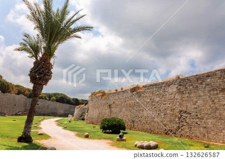 Stone powerful walls of old city, the ancient defense of Old Town, Rhodes, Dodecanese, Greece. High quality photo 132626587