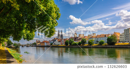 Panoramic view on beautiful Stone Bridge, Cathedral and Old Town. River Danube with colorful reflection, Regensburg, Bavaria, Germany. High quality photo Panoramic view on beautiful Stone Bridge, Cathedral and Old Town. River Danube with colorful reflection, Regensburg, Bavaria, Germany. High quality photo 132626603