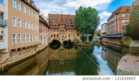 Famous view of Glasses of Nuremberg Heilig-Geist-Spital in old city. Beautiful reflection of the arch of the house in the shape of glasses, Nuremberg in Franconia, Bavaria, Germany.  132626605
