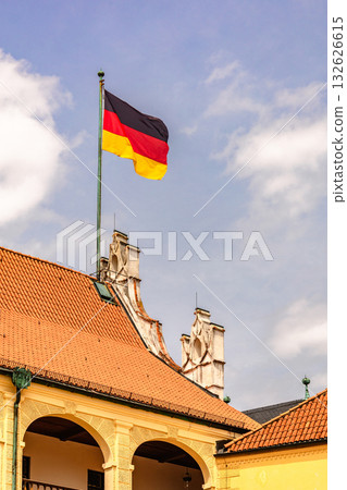 Germany flag flies on roof. High quality photo Germany flag flies on roof. High quality photo 132626615