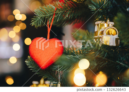 Abstract winter Christmas background with snow, fir branches and lights. Beautiful soft atmospheric natural background in pastel light colors. Xmas with tender bokeh. Abstract winter Christmas background with snow, fir branches and lights. Beautiful soft atmospheric natural background in pastel light colors. Xmas with tender bokeh. 132626643
