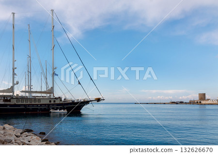 Panoramic view of beautiful yachts stand in harbor in port of Rhodes, Greece. High quality photo Panoramic view of beautiful yachts stand in harbor in port of Rhodes, Greece. High quality photo 132626670
