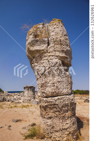 Massive limestone pillar formation standing in the desert landscape of Pobiti Kamani near Varna, Bulgaria. 132626961