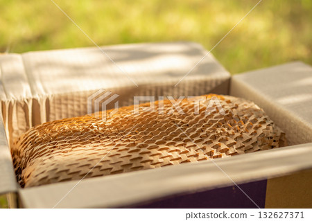 Eco friendly brown paper honeycomb wrap for product packaging parcel carton box Eco friendly brown paper honeycomb wrap for product packaging parcel carton box 132627371