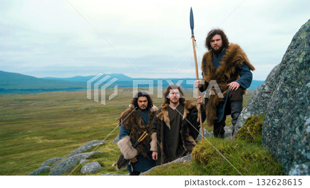 Group of Ancient Warriors in a Misty Landscape Preparing for a Hunt During Early Morning Hours 132628615