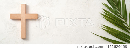 Palm Sunday symbol with wooden cross and green palm leaves, suitable for backgrounds 132629468