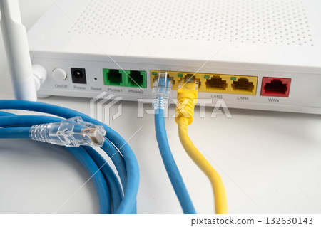 Ethernet cable with wireless router connect to internet service provider network. Ethernet cable with wireless router connect to internet service provider network. 132630143