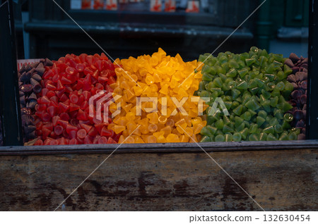 A cuberdon, a cone-shaped Belgian candy. It is also known in dutch as a neus, Gentse neus (Ghent nose), or neuzeke (little nose) and in french as chapeau-de-pretre (priest's hat). A cuberdon, a cone-shaped Belgian candy. It is also known in dutch as a neus, Gentse neus (Ghent nose), or neuzeke (little nose) and in french as chapeau-de-pretre (priest's hat). 132630454