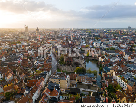 Drone footage showing Ghents historic center with towers, canals, and traditional Belgian architecture. Drone footage showing Ghents historic center with towers, canals, and traditional Belgian architecture. 132630457