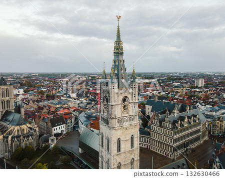 High aerial view showing Ghents traditional rooftops and church towers. High aerial view showing Ghents traditional rooftops and church towers. 132630466