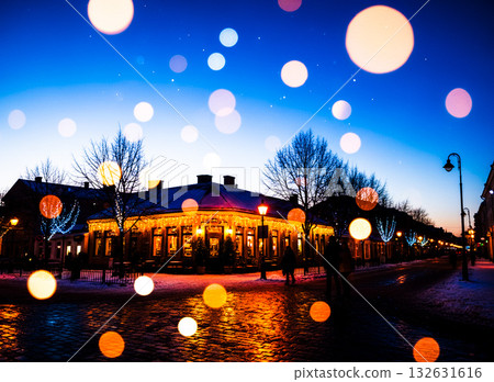 Warm lights illuminating the winter city 132631616