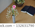 Flowers in a vase: roses and gypsophila 132631790
