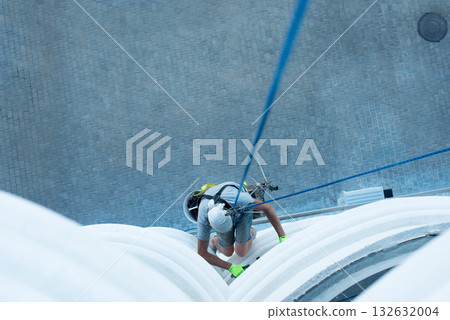 high-altitude climber. The profession of working at height. 132632004