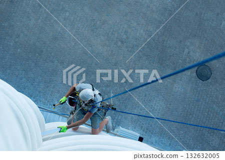 high-altitude climber. The profession of working at height. high-altitude climber. The profession of working at height. 132632005