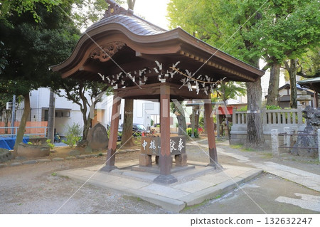 Hashido Inari Shrine near Senju Ohashi Bridge, with its chozuya (purification fountain) 132632247