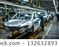 Automobile assembly manufacturing site (coordination between engineers and assembly line workers) 132632893