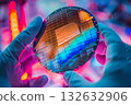 A technician working with semiconductor wafers (cutting-edge electronic component manufacturing process) 132632906