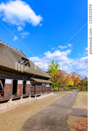 Autumn Michinoku Lakeside Park: Autumn leaves, kochia and old houses 132632978