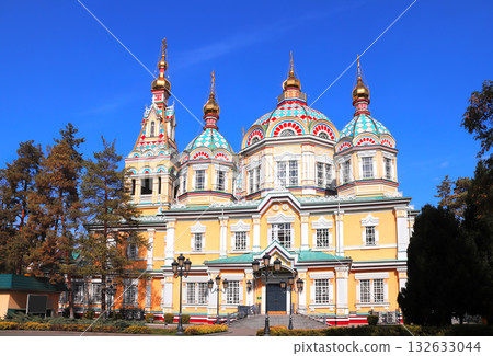 Ascension Cathedral, Orthodox cathedral of Almaty, Kazakhstan. Beautiful autumn scenic with wood church Zenkov Cathedral In Panfilov park, Almaty, Kazakhstan 132633044