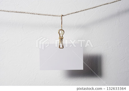 9 white cards attached with a clip 132633364