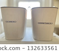 Two laundry baskets lined up in a bright room, expressing ideas for living and a sense of cleanliness. 132633561